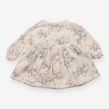 Beige sweater dress with blue floral print