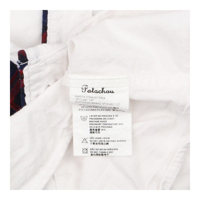 Patachou tartan trousers and white shirt