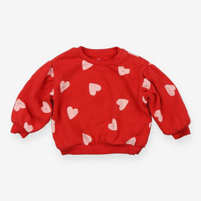 Red sweater with pink heart 