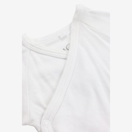 white wrap over bodysuit