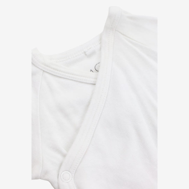 white wrap over bodysuit