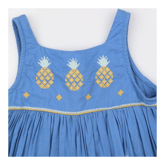 Blue dress with pineapple appliques