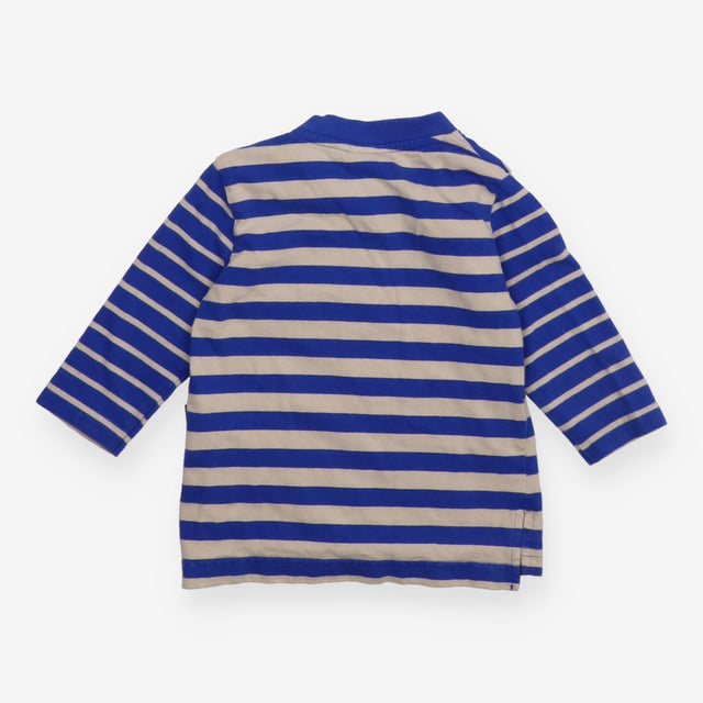 Blue and beige striped t-shirt green holes
