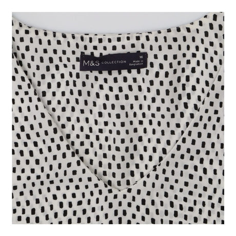 Blouse white with black squares sleeveless