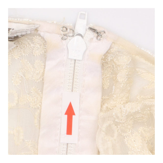 Ivory Floral Beaded Sleeveless Occasion Top