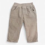 Beige cord trousers navy stripe lining