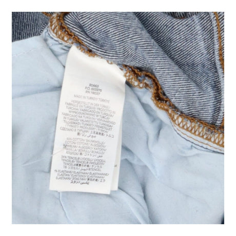 Mid Blue Girlfriend Jeans – Relaxed Fit, Mid Rise 