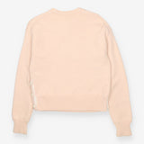 Pink knit crew neck sweater with side button deta