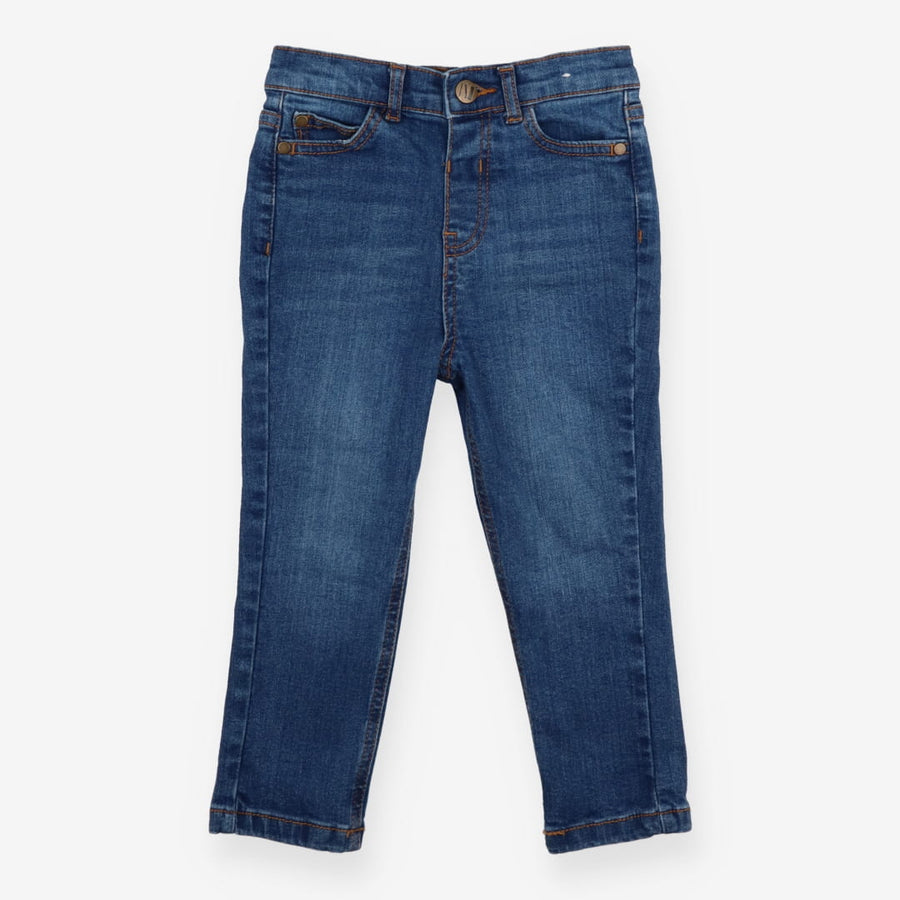 Dark blue jeans with gold button