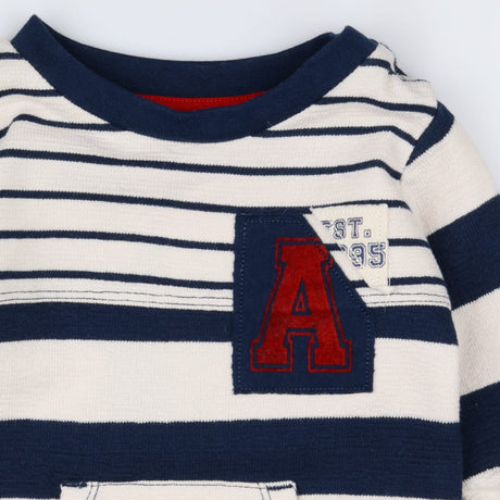 Angel and Rocket navy striped sleepsuit with red A