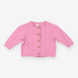 Pink knit cardigans with wooden button