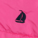 Pink puffer coat with navy trim