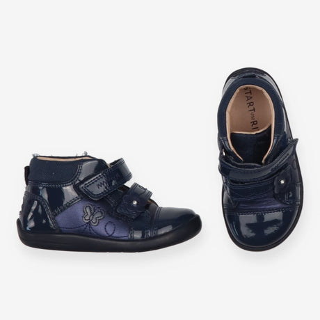 Discover Navy Patent Boots