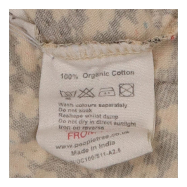 Black Cream Ditsy Organic Jersey Peplum Dress