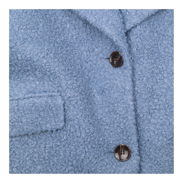 Boucle coat pale blue textured longline button fro