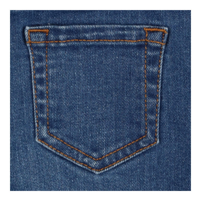 Dark blue jeans with gold button