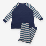 Pyjama with red dragon top and stripy bottom