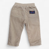 Beige cord trousers navy stripe lining