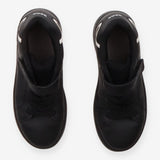 Trainers black white marks on heel velcro