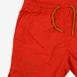 Red swim shorts