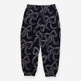 Navy joggers with white bows