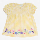 Yellow gingham smock with flowers