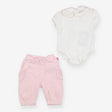 Collared bodysuit and pink trousers outfit