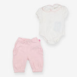 Collared bodysuit and pink trousers outfit