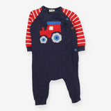 Navy knit tractor romper with red stripe sleeves
