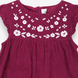 Plum cord dress with white flower applique