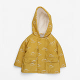 Coat yellow with Stegosaurus print and fleece lini