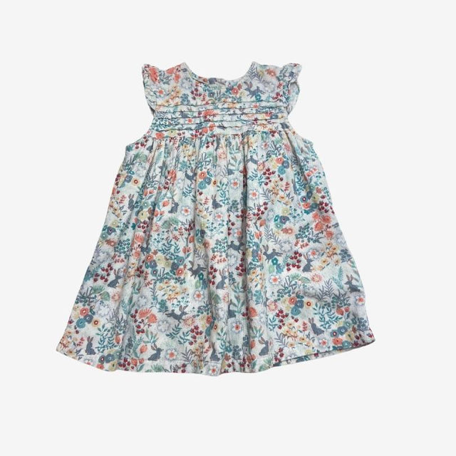 White needlecord dress with rabbits and flowers