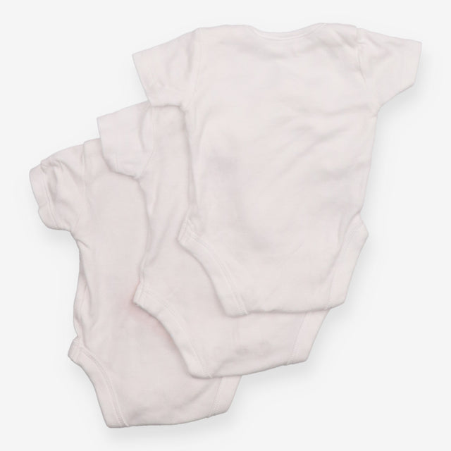 3 tiny baby white bodysuits