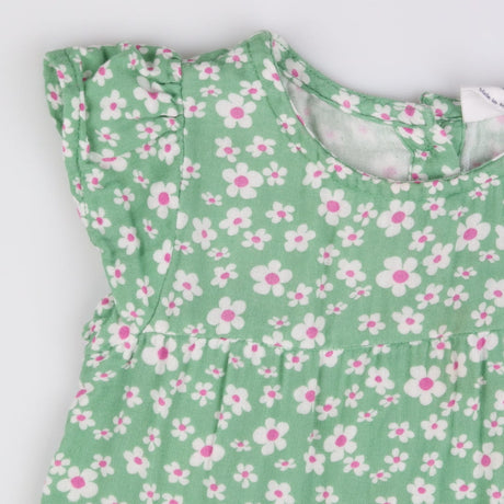 Green jersey dress with white flowers