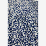 sleeveless blue dress white flower