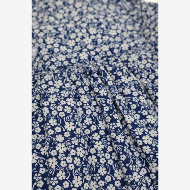 sleeveless blue dress white flower