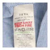 Blue t-shirt with slogan "To the beach"