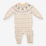 Cream knit romper with penguins