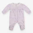 White sleepsuit with purple floral and frill colla