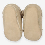 Gold pram shoes with buckles