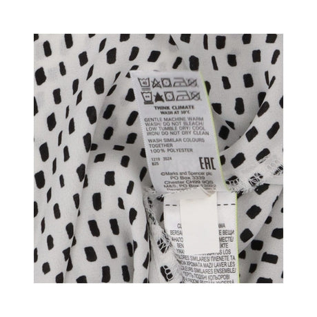 Blouse white with black squares sleeveless