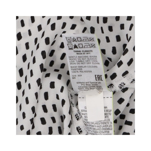 Blouse white with black squares sleeveless