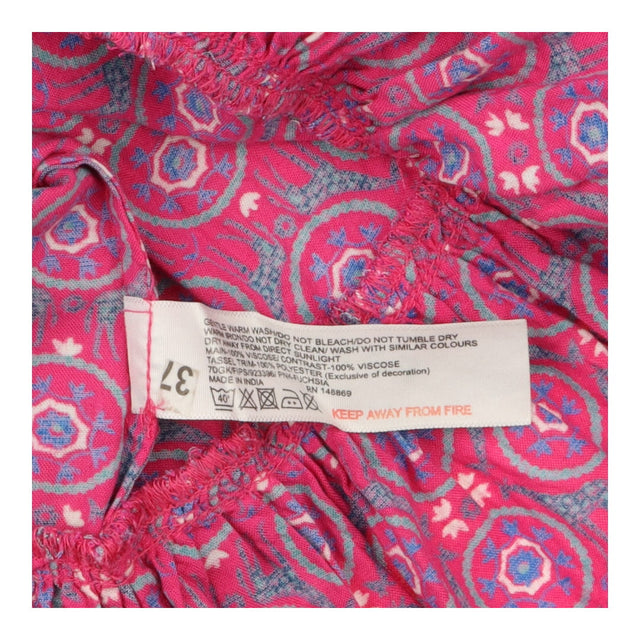 Pink summer dress with giraffes