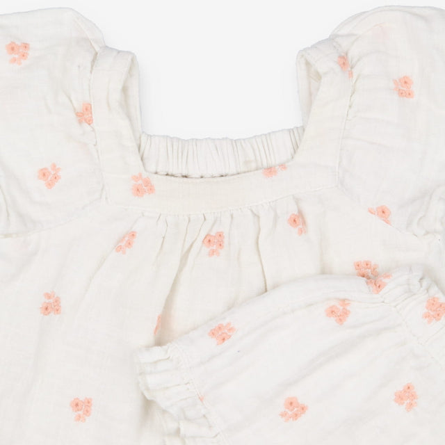 White Top and shorts outfit with peach flowers