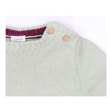 Green knit outfit with polar bears