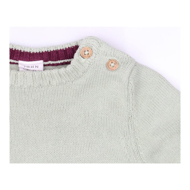 Green knit outfit with polar bears