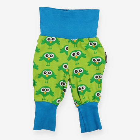 Green joggers with owls and blue cuffs