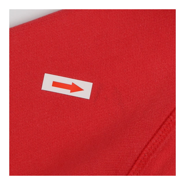 Red zip up hoodie with giraffe