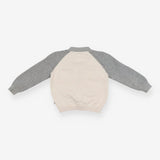 Cardigan grey sleeves cream body orange edging