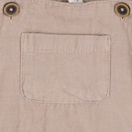 Beige cord dungarees